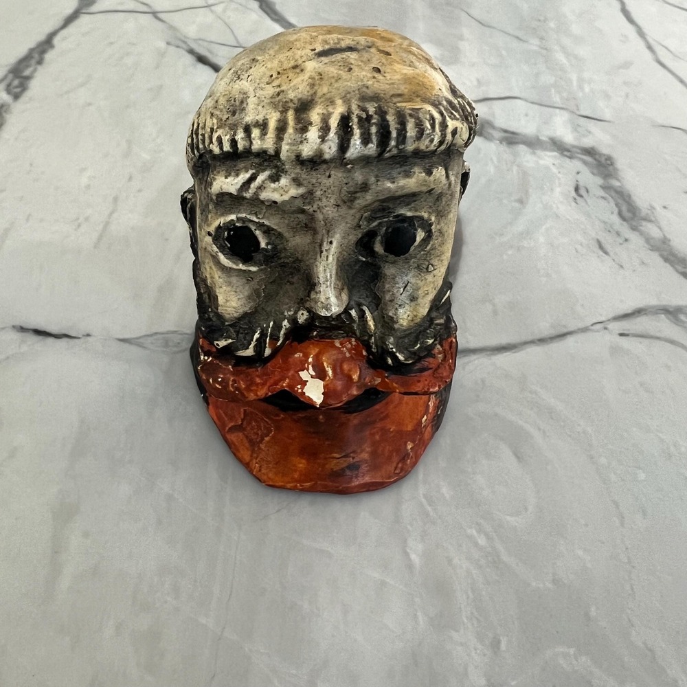 Sculpture of man's head folk art expressionist